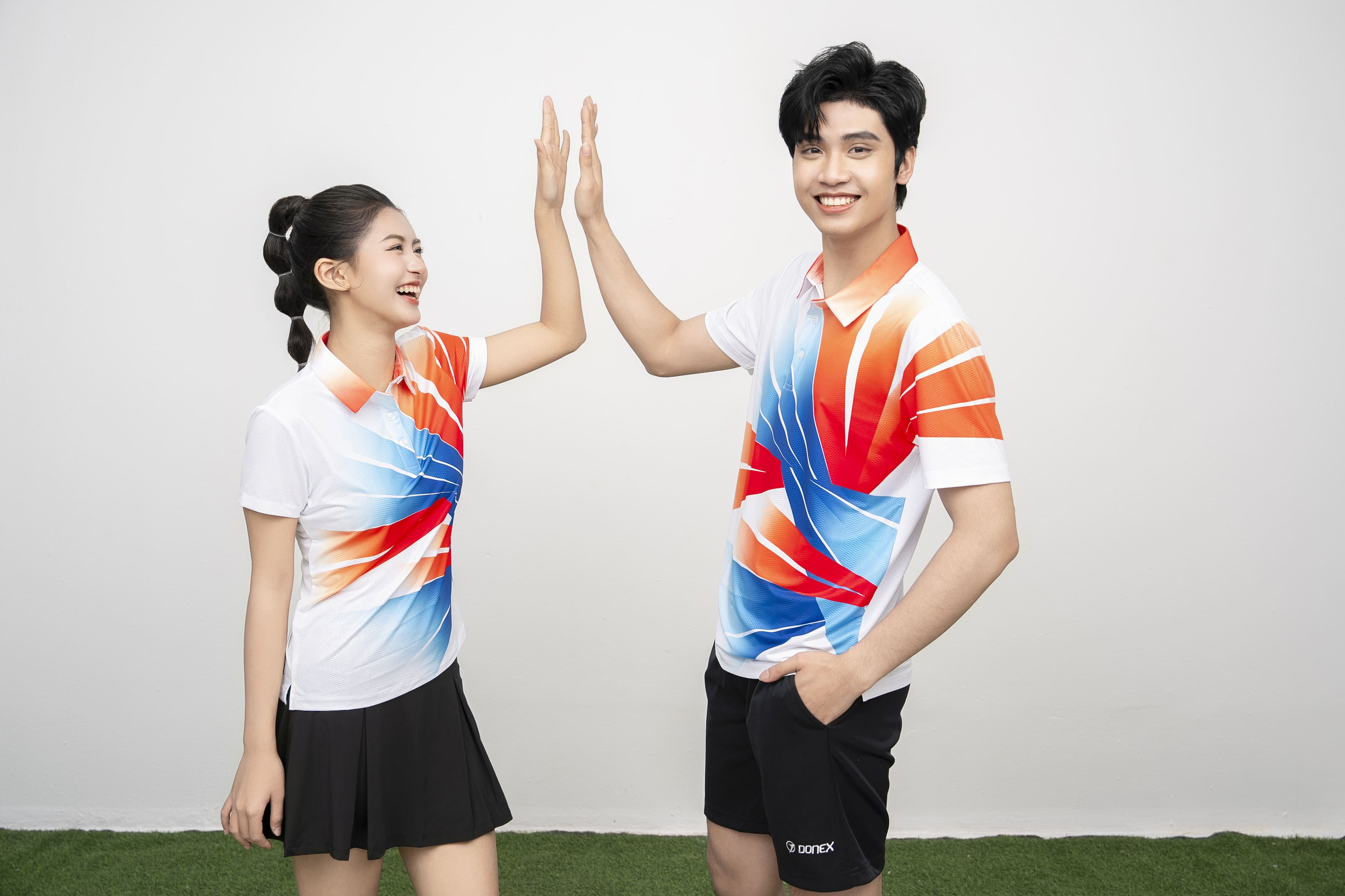 Áo thể thao Nữ AC-3850 Trắng phối cam