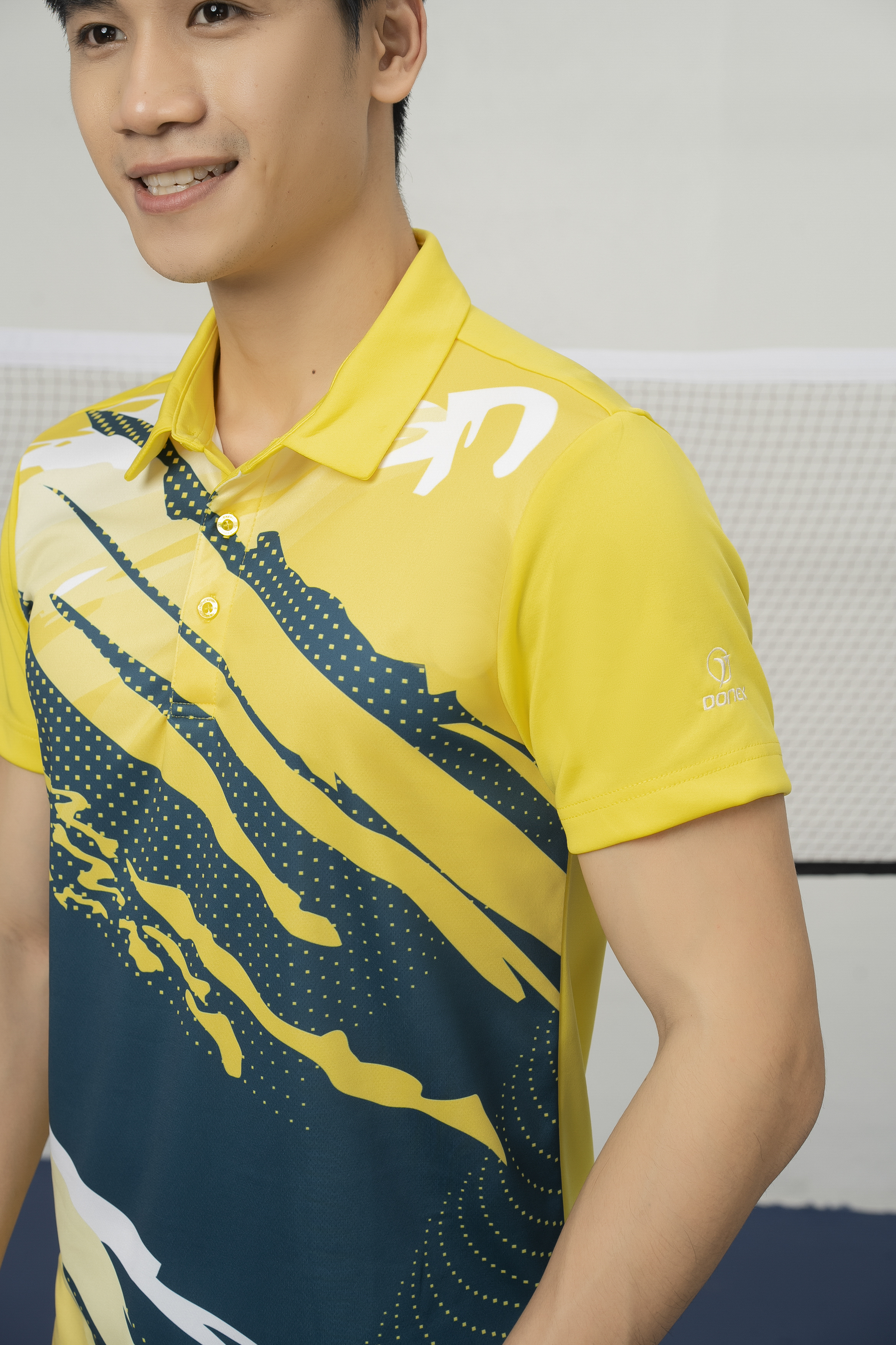 Áo thể thao MC-9132 Vàng phối xanh lục bảo